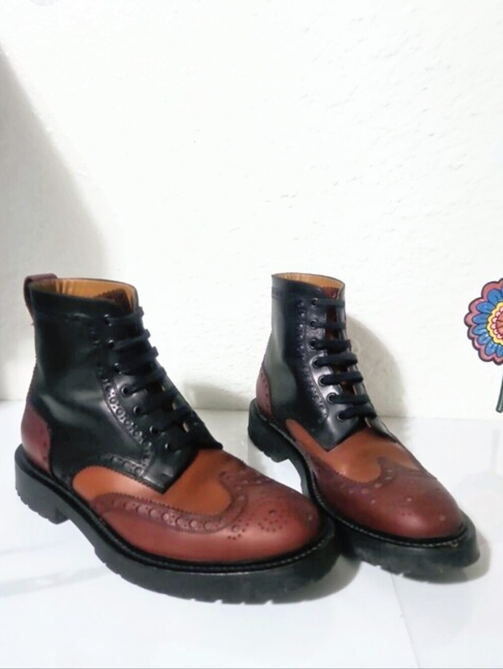 Burberry Barkeston tricolor leather combat boots featuring a wingtip brogue toe